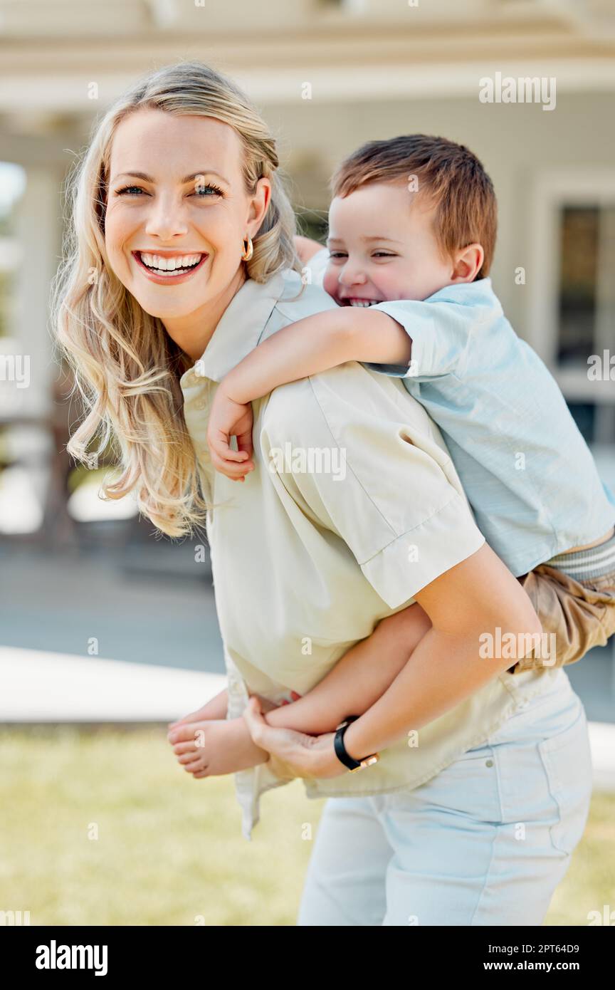 Portrait of young mother giving her son a piggyback ride, Stock Photo,  Picture And Royalty Free Image. Pic. WES-DGOF00925