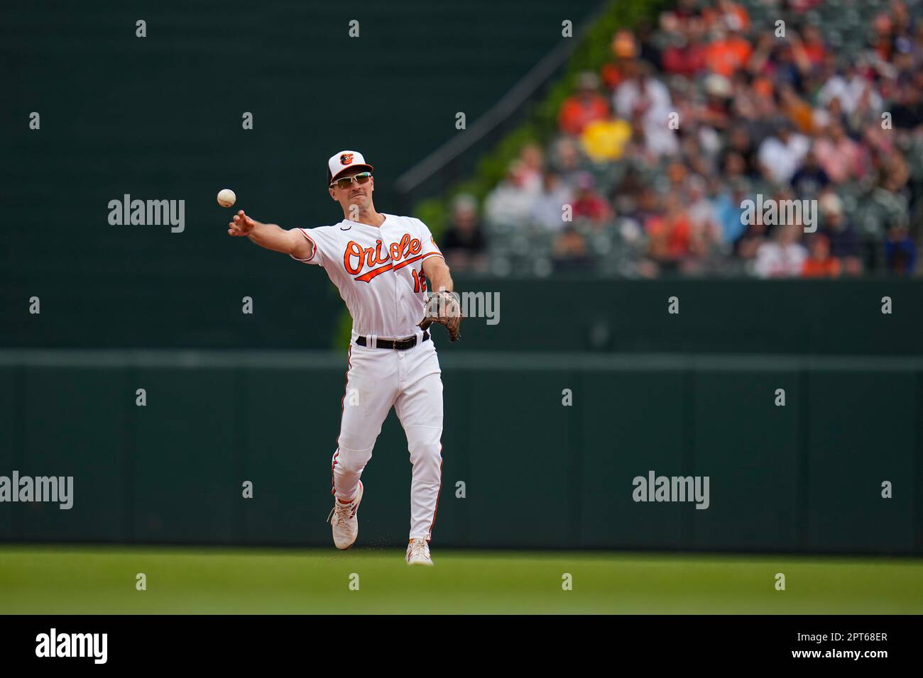 Baltimore Orioles second baseman Adam Frazier reaches for a ground