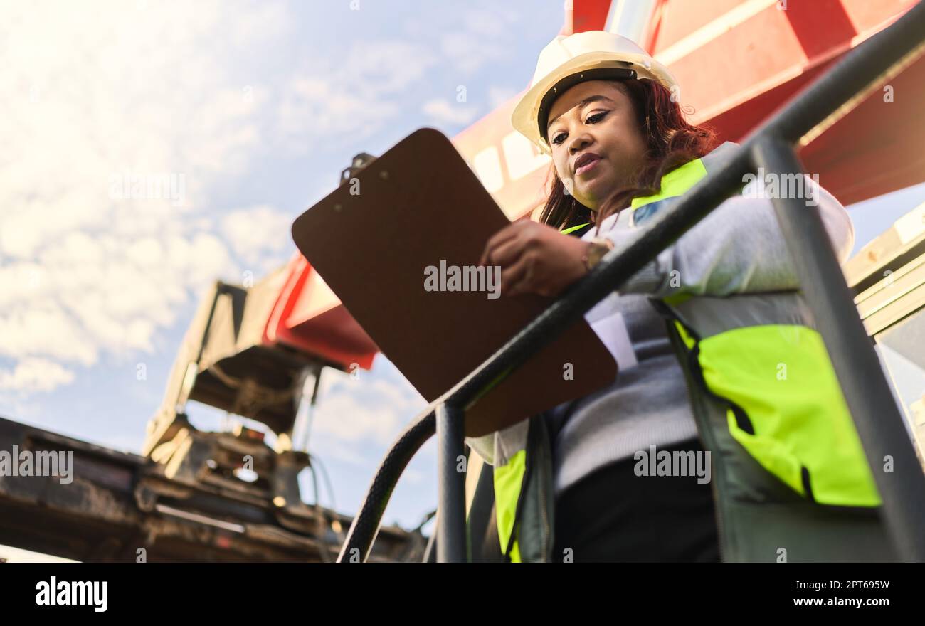 Documents, shipping and supply chain with a logistics black woman ...