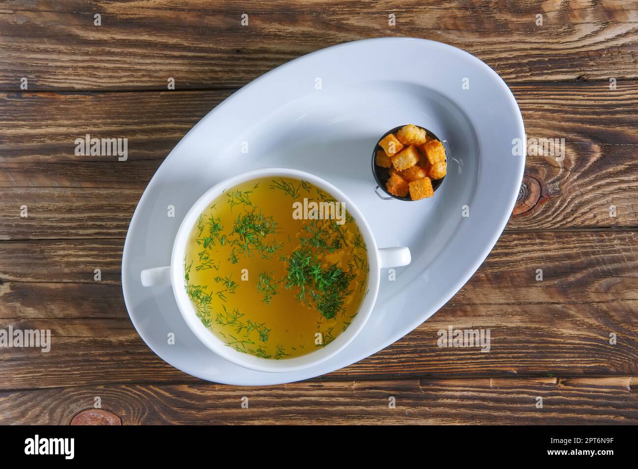 Plate of chicken bouillon Stock Photo Alamy