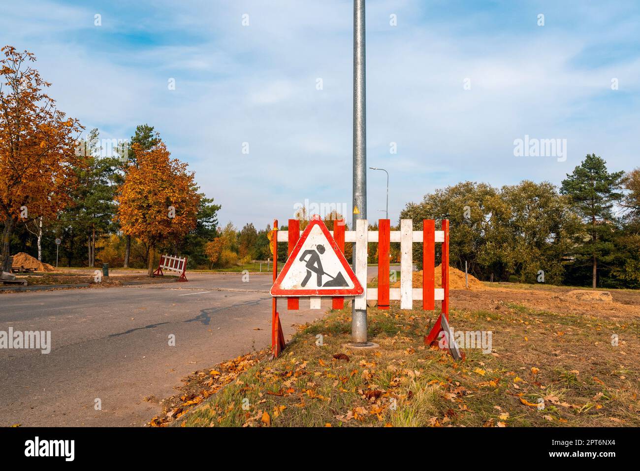 Road works sign for construction works on the street. Road under ...