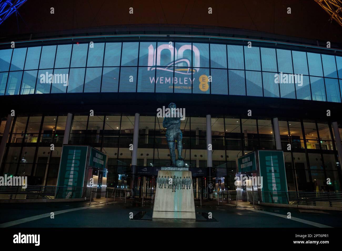 Wembley Stadium, London, UK. 27th April 2023. Night time view on the eve of the 100th birthday of England’s national stadium. Wembley Stadium marks it's centenary year with a changing display on the eve of it's 100th anniversary on 28th April. First opened in 1923, it has been home to some of the most historic and memorable moments of the last century. From the Olympics in 1948, the World Cup in 1966, Live Aid in 1985, to the Women’s EURO’s in 2022.  Photo by Amanda Rose/Alamy Live News Stock Photo