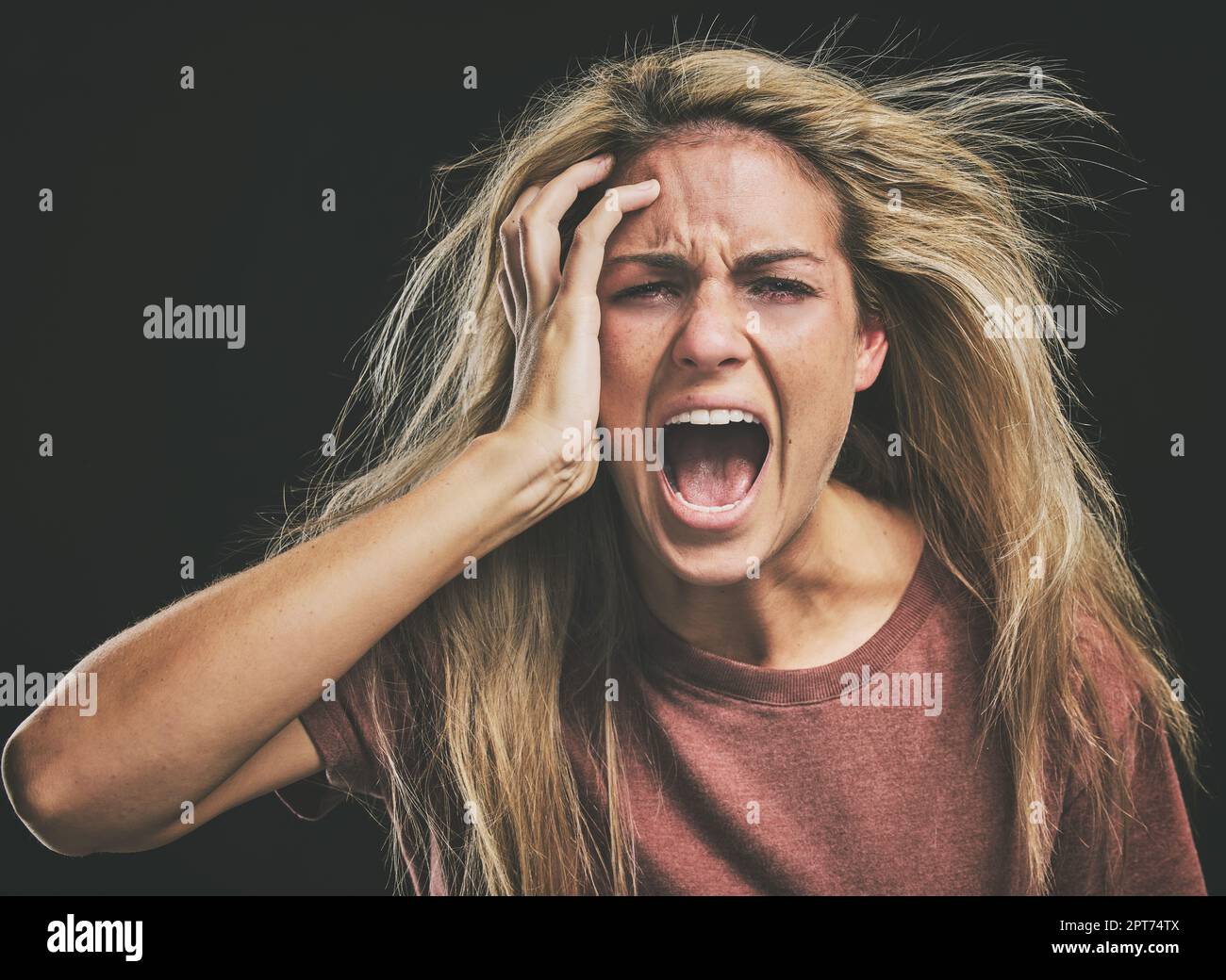 Face, mental health and screaming woman headache, anxiety or stress