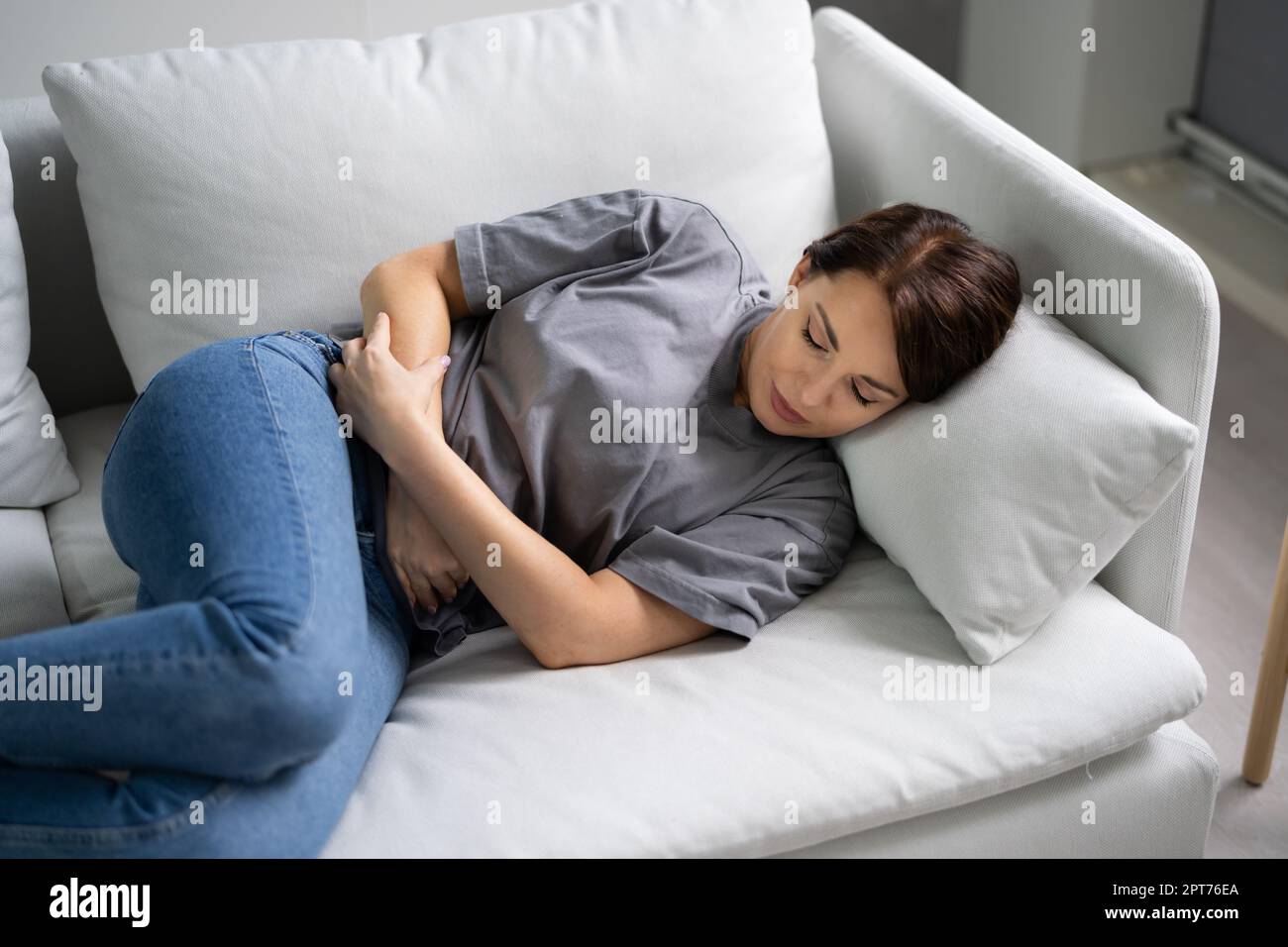 Women With Stomach Ache. Diarrhea Or PMS Pain Stock Photo Alamy
