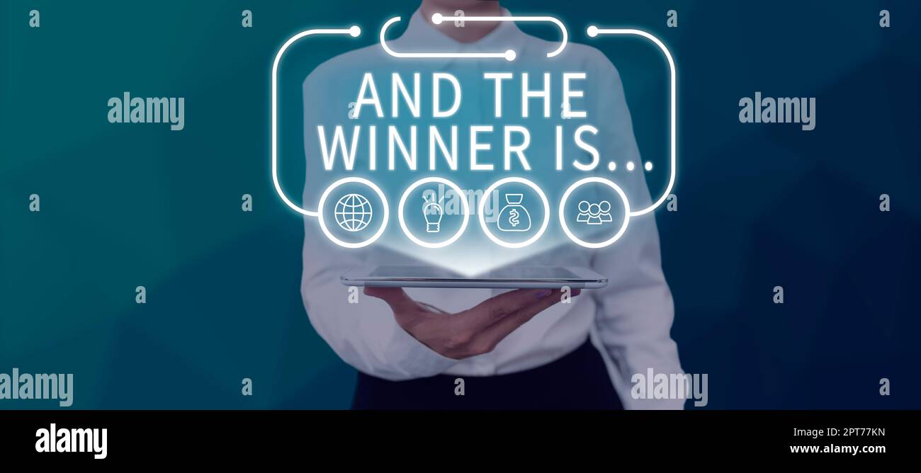 Hand writing sign And The Winner Is..., Word for Announcing who the ...