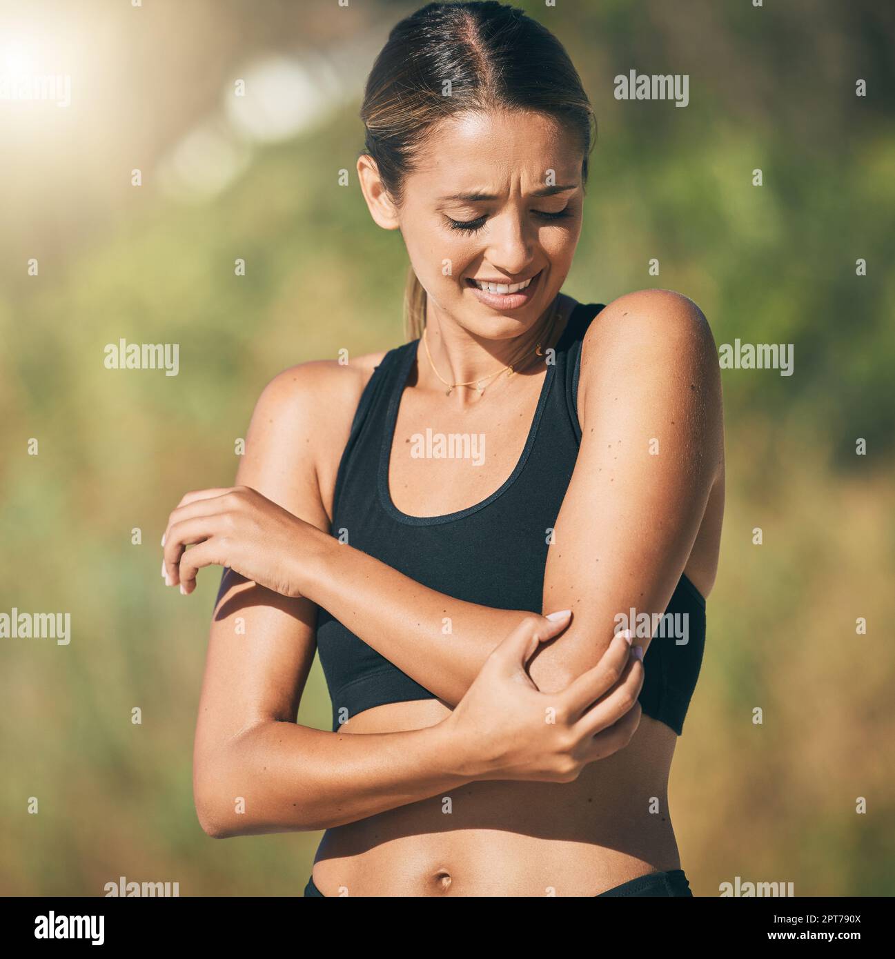 Fitness, woman and elbow in pain, injury or sports accident of runner