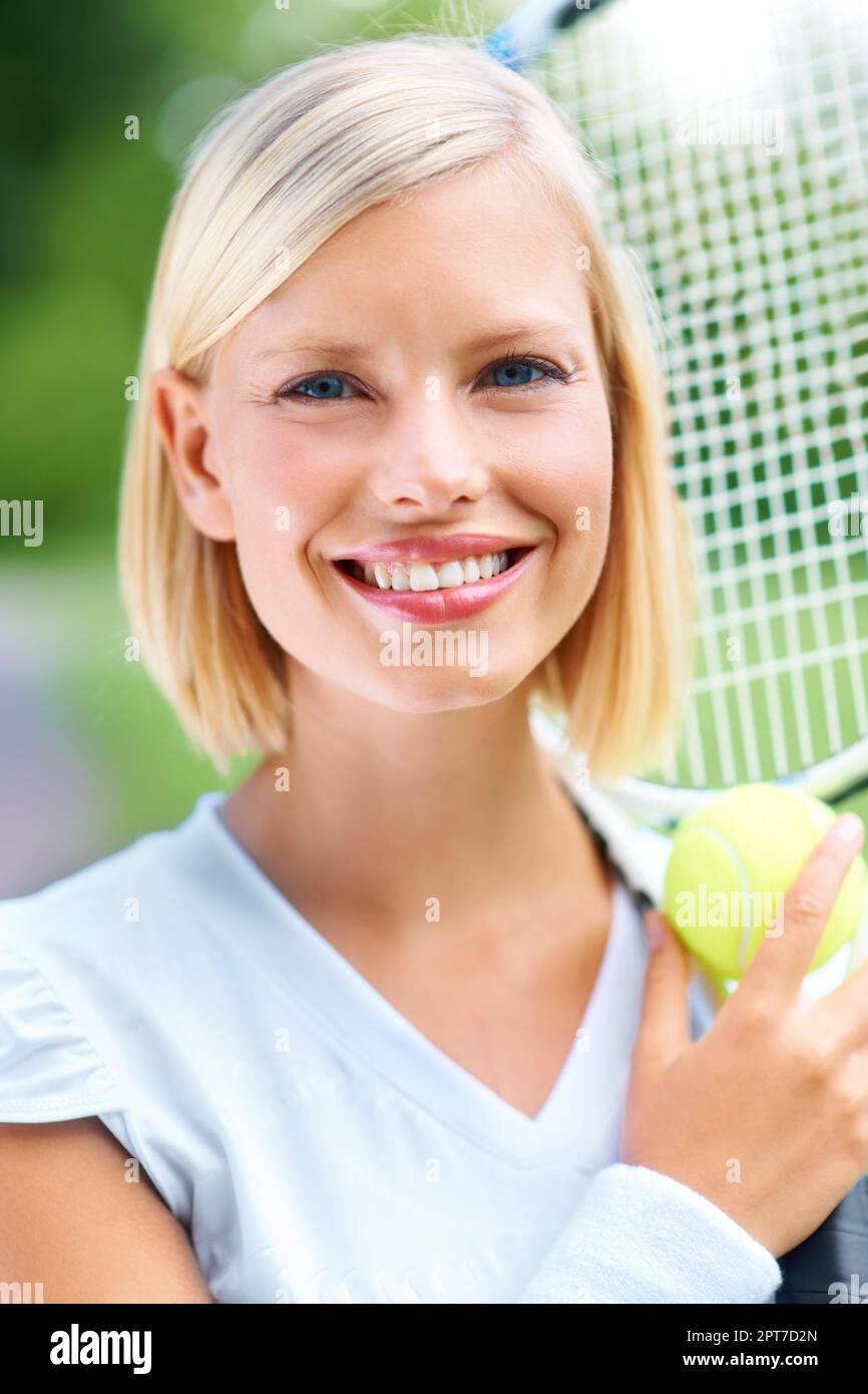 Bringing beauty to the game. Portrait of a young female tennis player