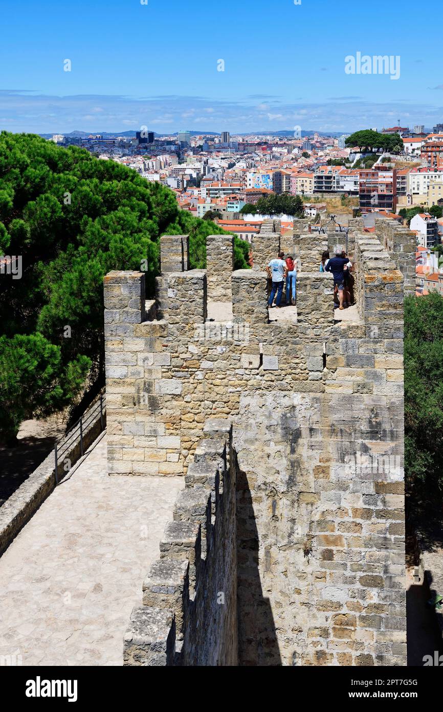 Castle with ramparts and towers in Castello de San Jorge, Lisbon ...