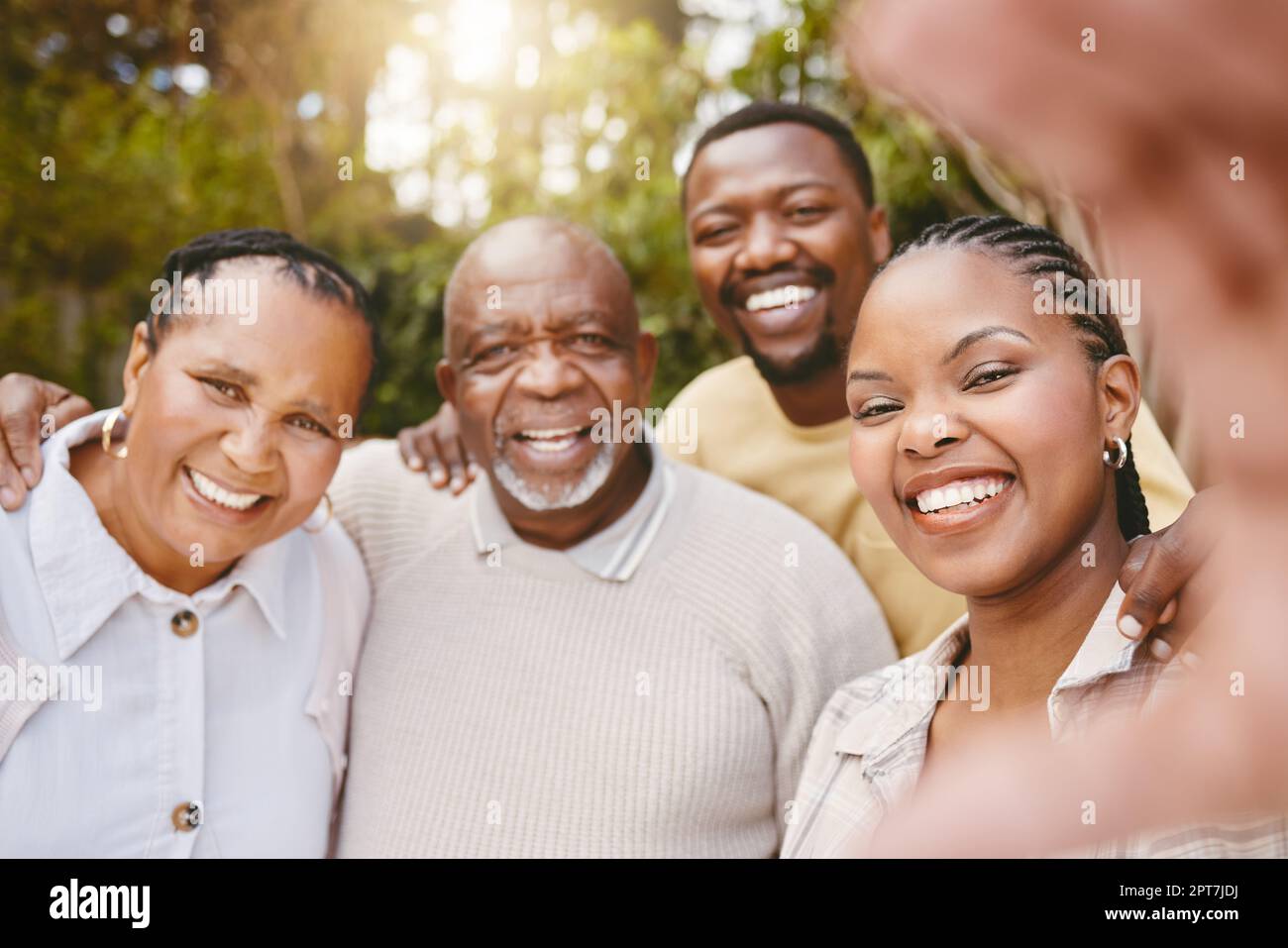 The picture of a happy family. a woman taking a selfie with her partner and his parents Stock Photo