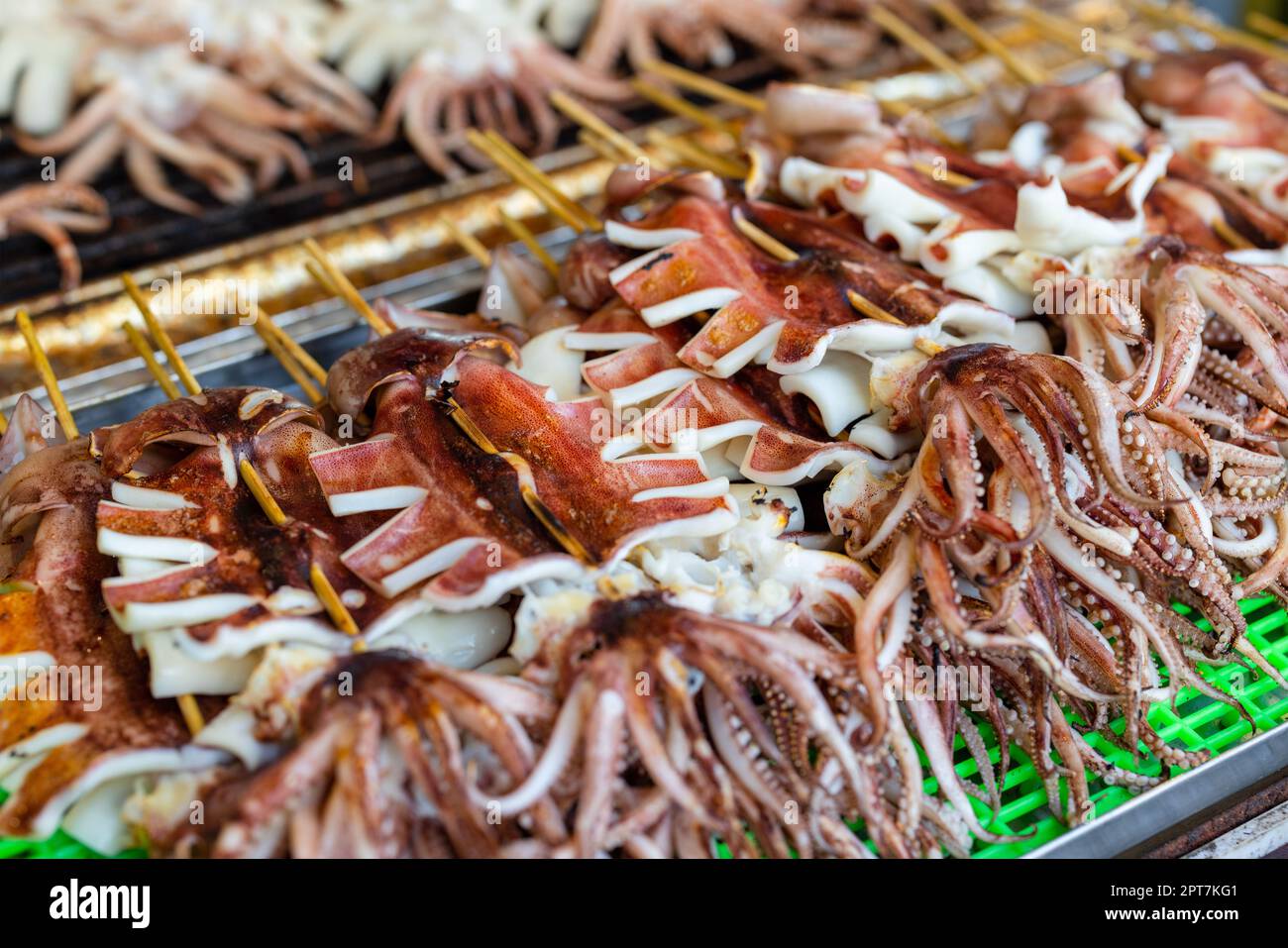 Grill squid in street market of Taiwan Stock Photo - Alamy