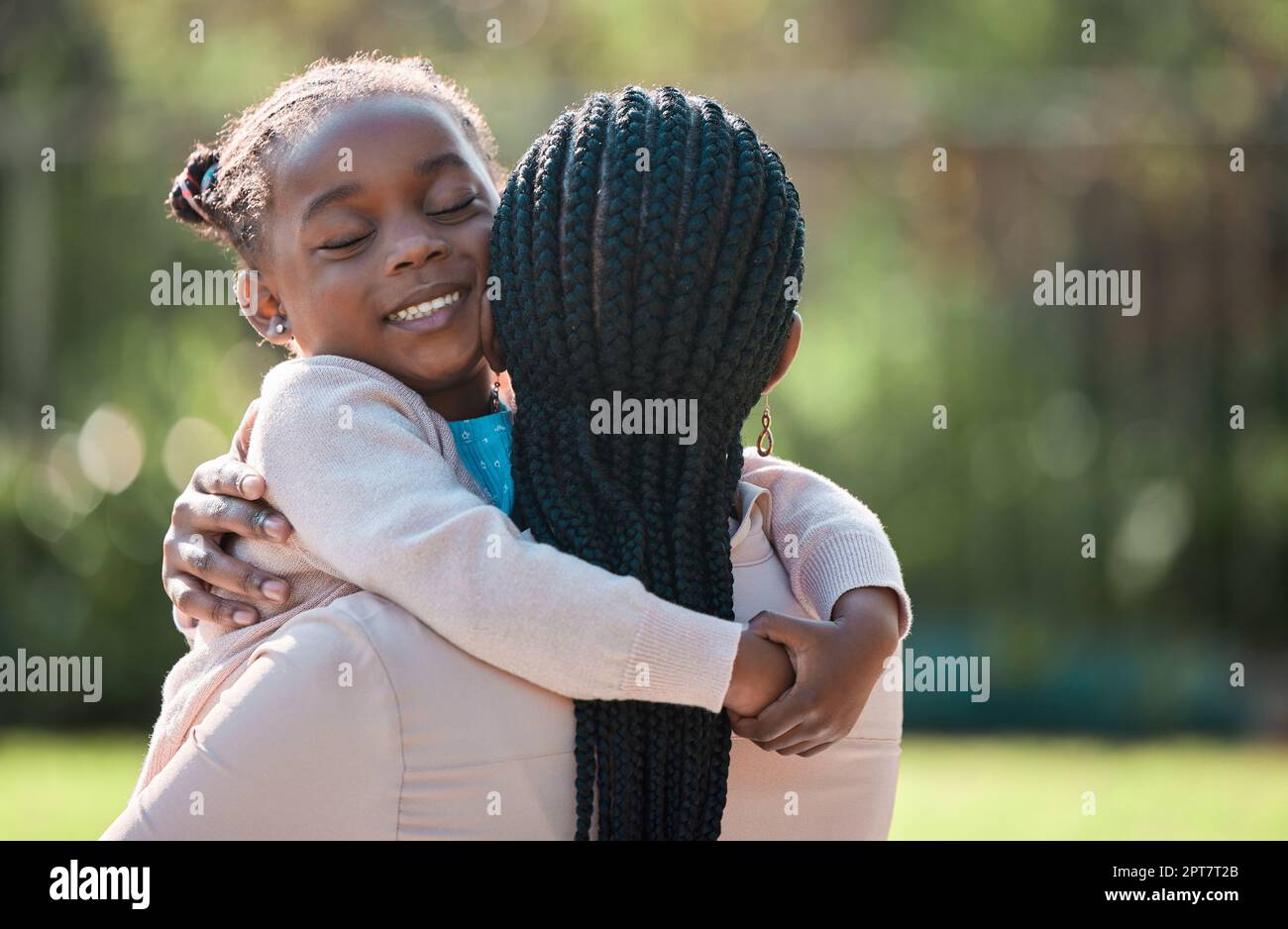 Everyone deserves to feel loved. an adorable little girl spending the day outdoors with her mother Stock Photo