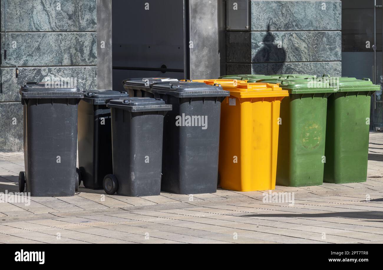 Row of garbage cans for wate separation and recycling Stock Photo - Alamy