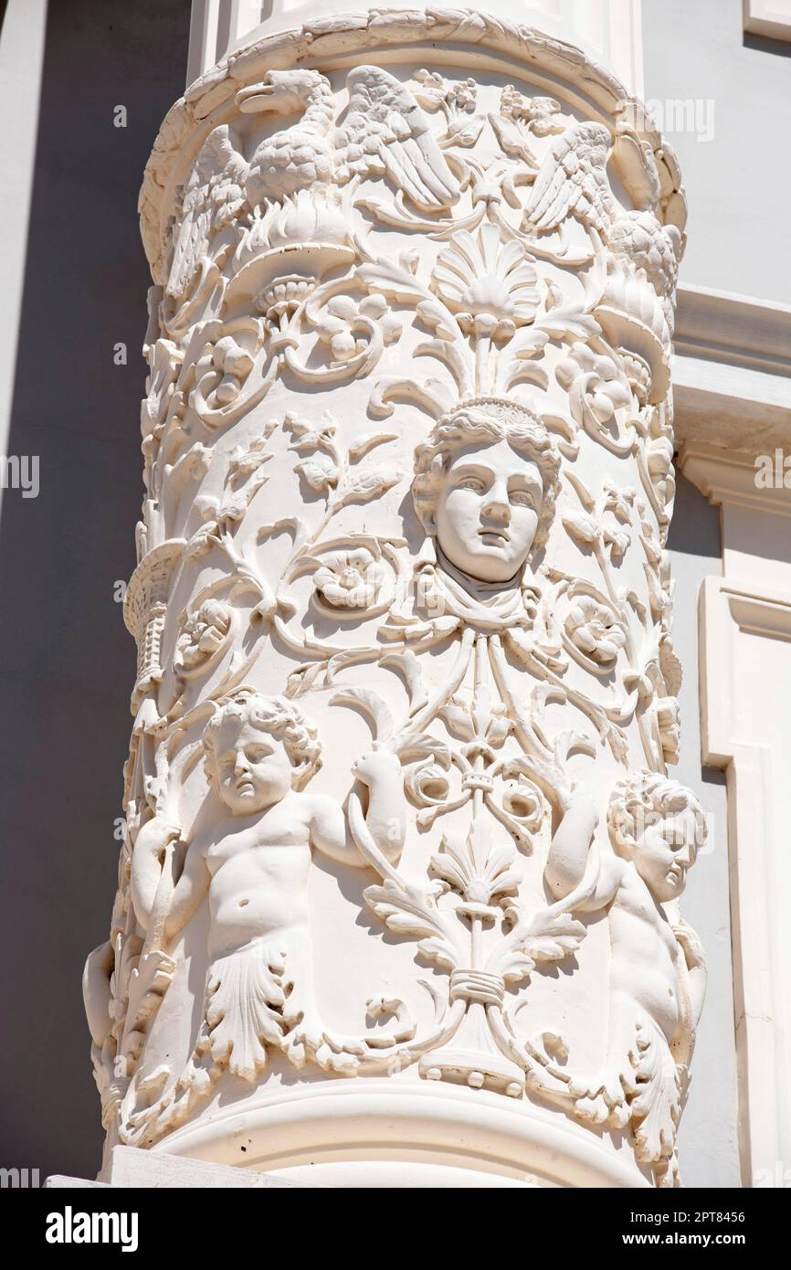 Putti and mythical creatures on stone columns, City Hall, Guiseppe Tartini Square, Piran, Slovenia Stock Photo