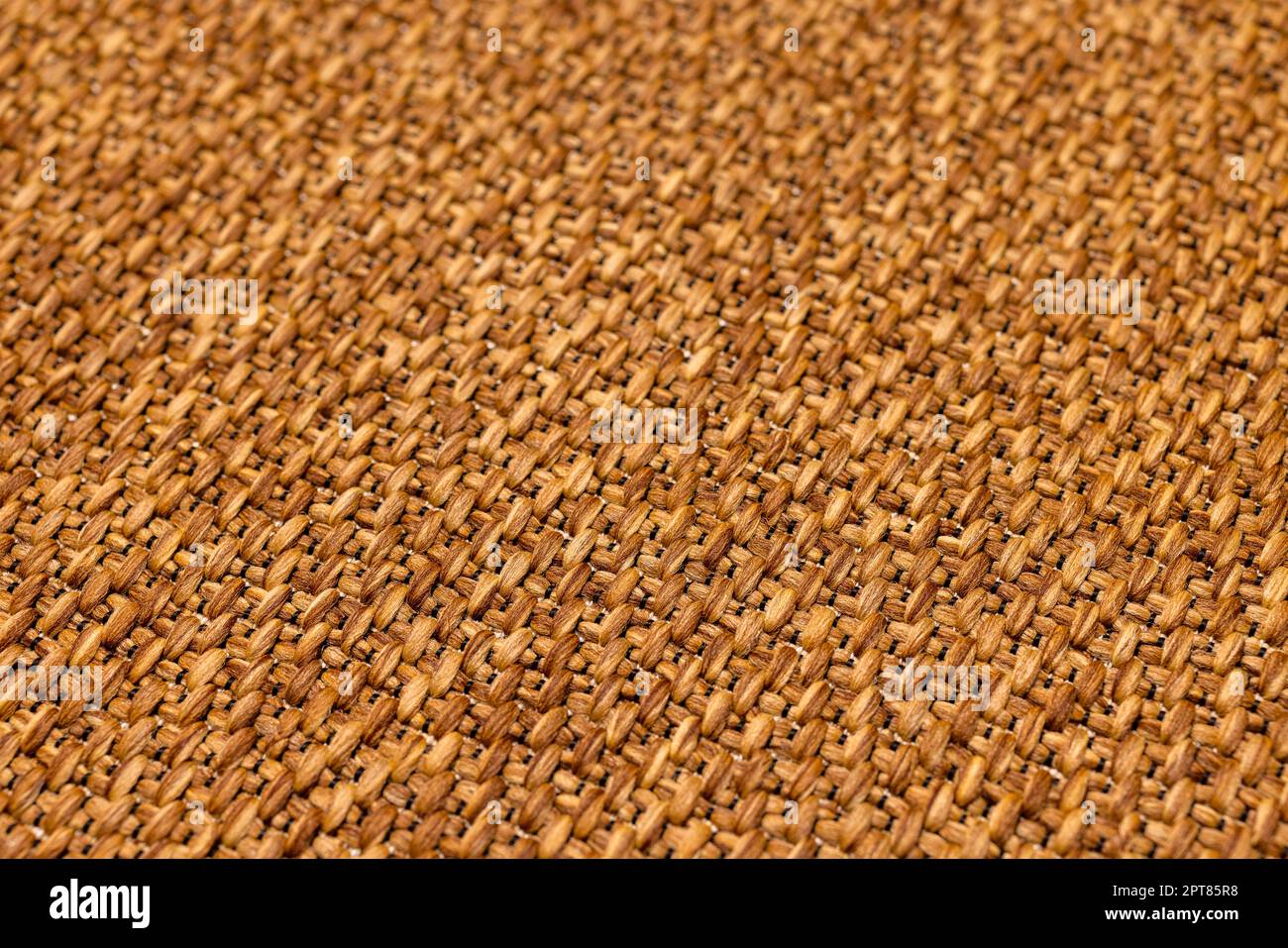 Braided rough pad beige straw rug Stock Photo Alamy