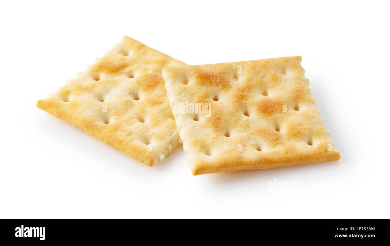 Two crackers placed on a white background. Stock Photo