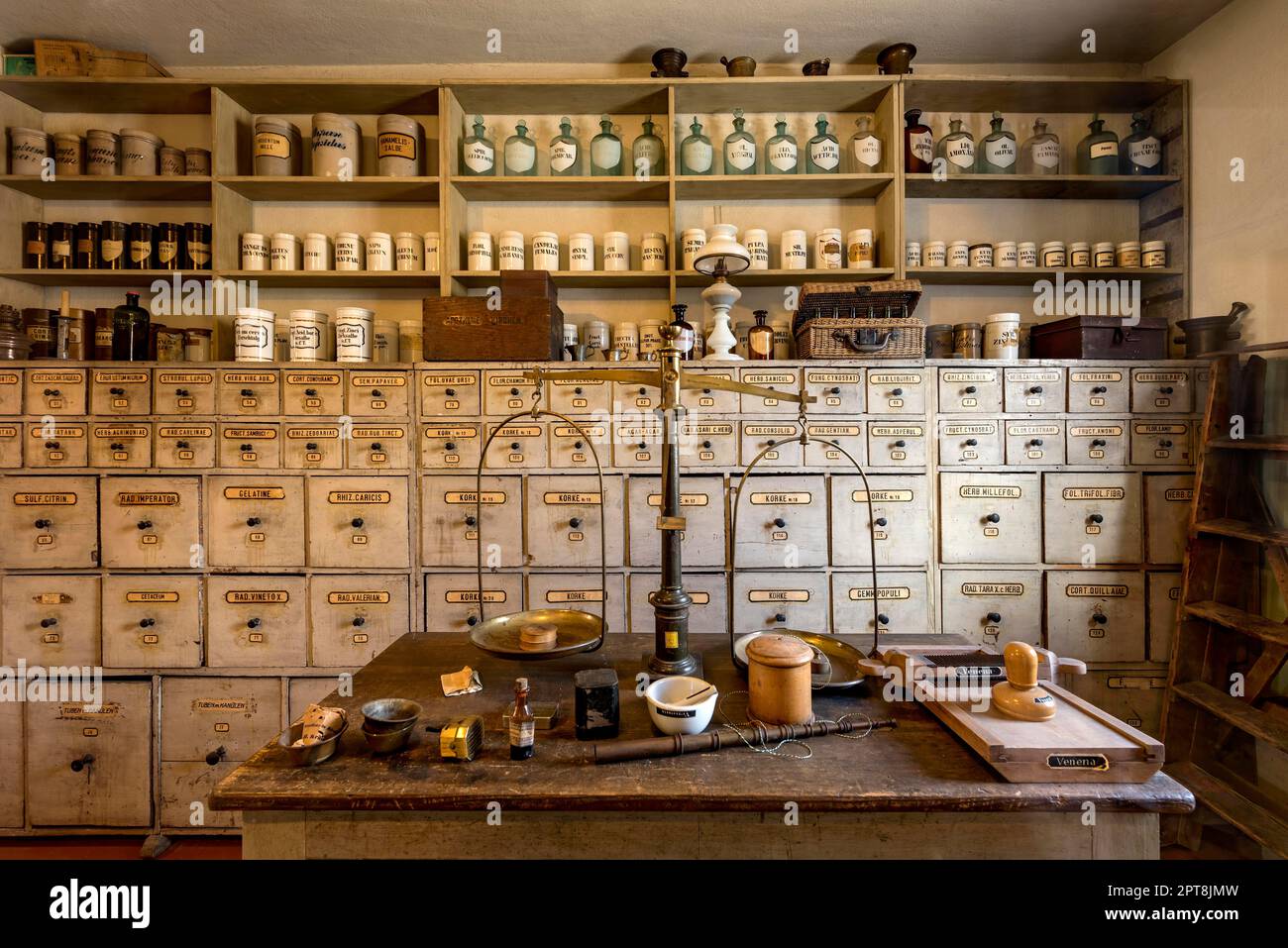 Old pharmacy, counter, pharmacy cupboard with drawers, wall cupboard, historical house from Rauschenberg, market place, Hessenpark open-air museum Stock Photo