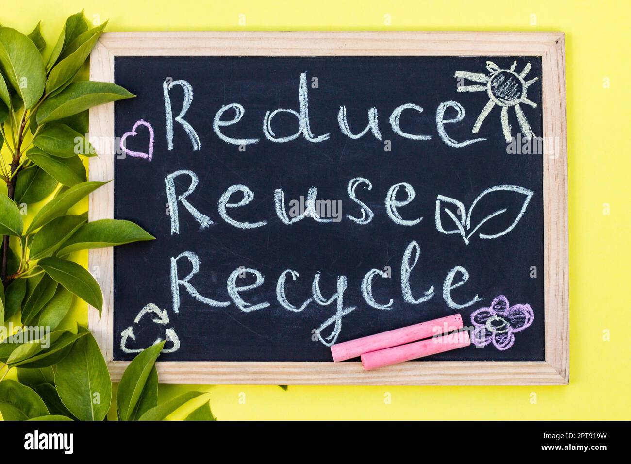 Chalk board Reduse Reuse Recycle sign on a yellow background with green ...