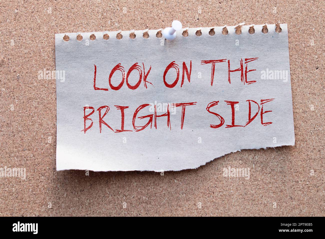 Look on the bright side advice or reminder - sticky note on a clipboard with a cup of tea. Stock Photo