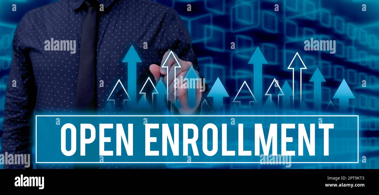 Hand writing sign Open EnrollmentThe yearly period when people can ...