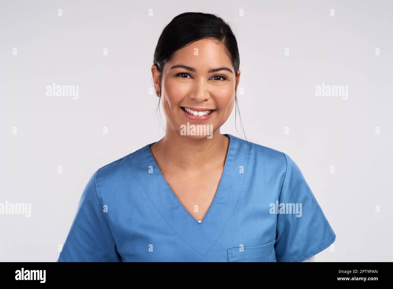 Seems death is the next destination, Im your phoenix reincarnation. Portrait of a young beautiful doctor in scrubs against a white background Stock Photo