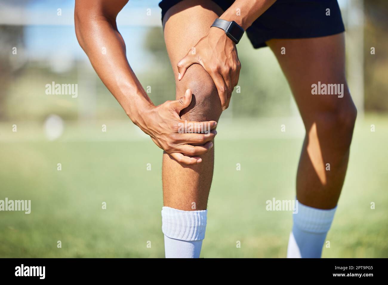 Sport injury, knee and fitness, soccer field and muscle with pain, soccer player hurt and