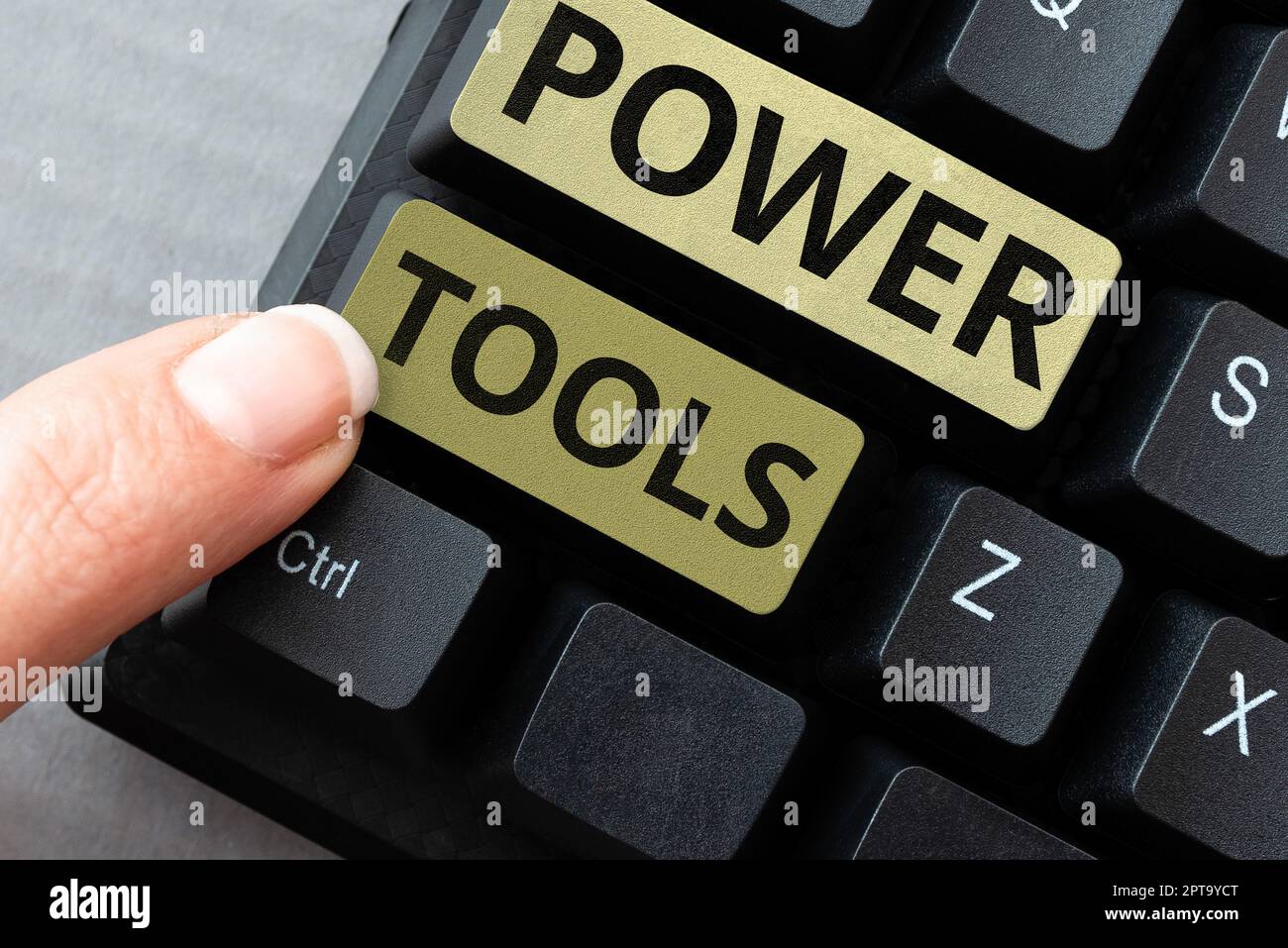 Sign displaying Power Tools, Conceptual photo tools powered by an