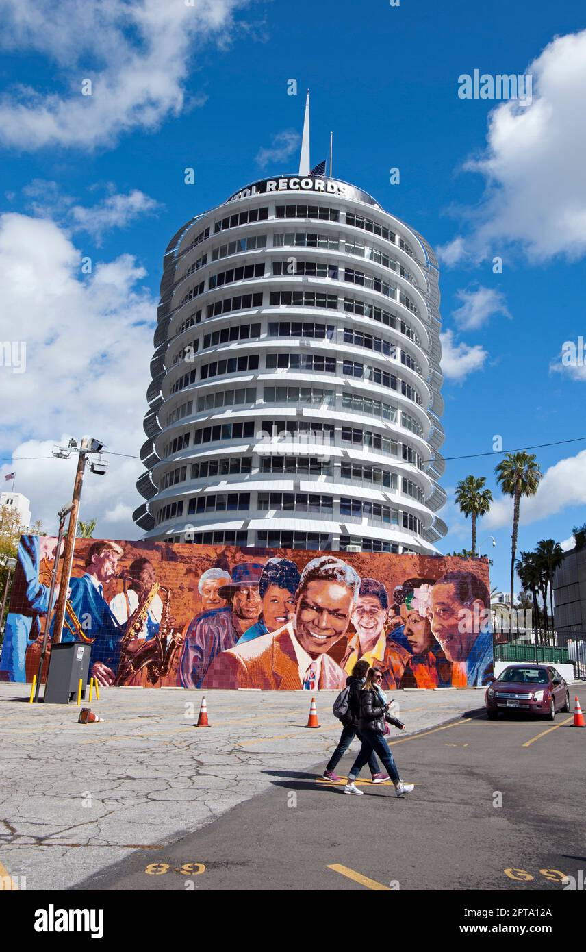 The Capitol Records building with a mural of Jazz greats including Nat