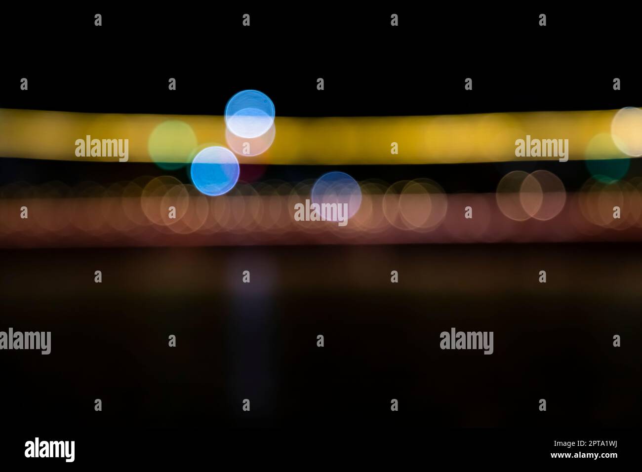 Abstract colorful bokeh light effects on the night black background ...