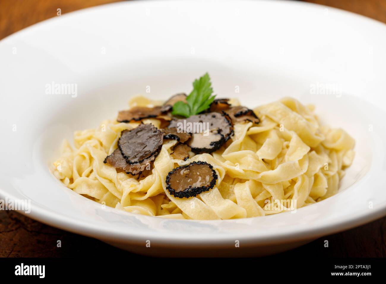 black truffle on home made pasta Stock Photo