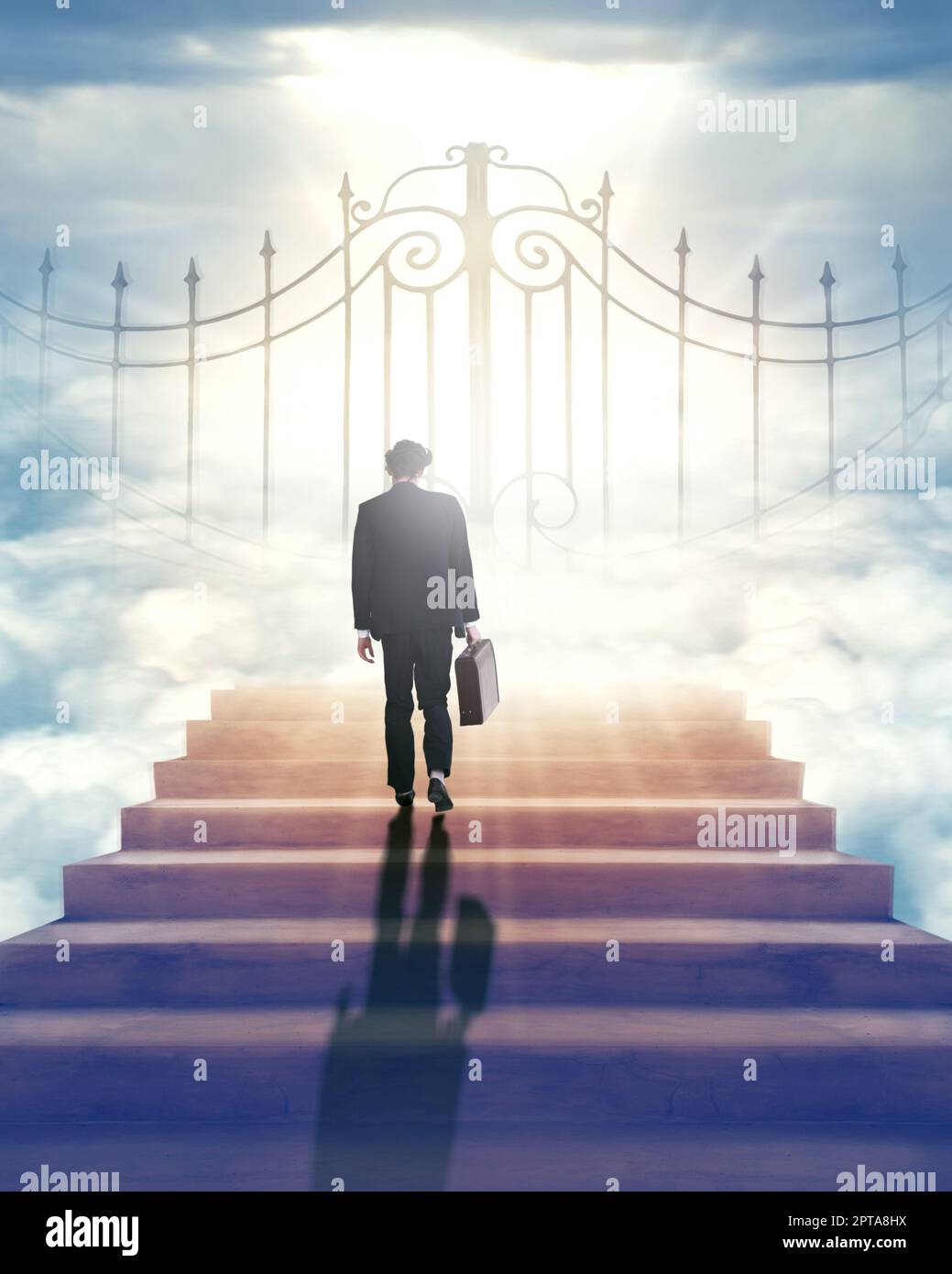 Will the gates of Heaven open for me. Rearview shot of a businessman standing at the Pearly Gates of Heaven Stock Photo