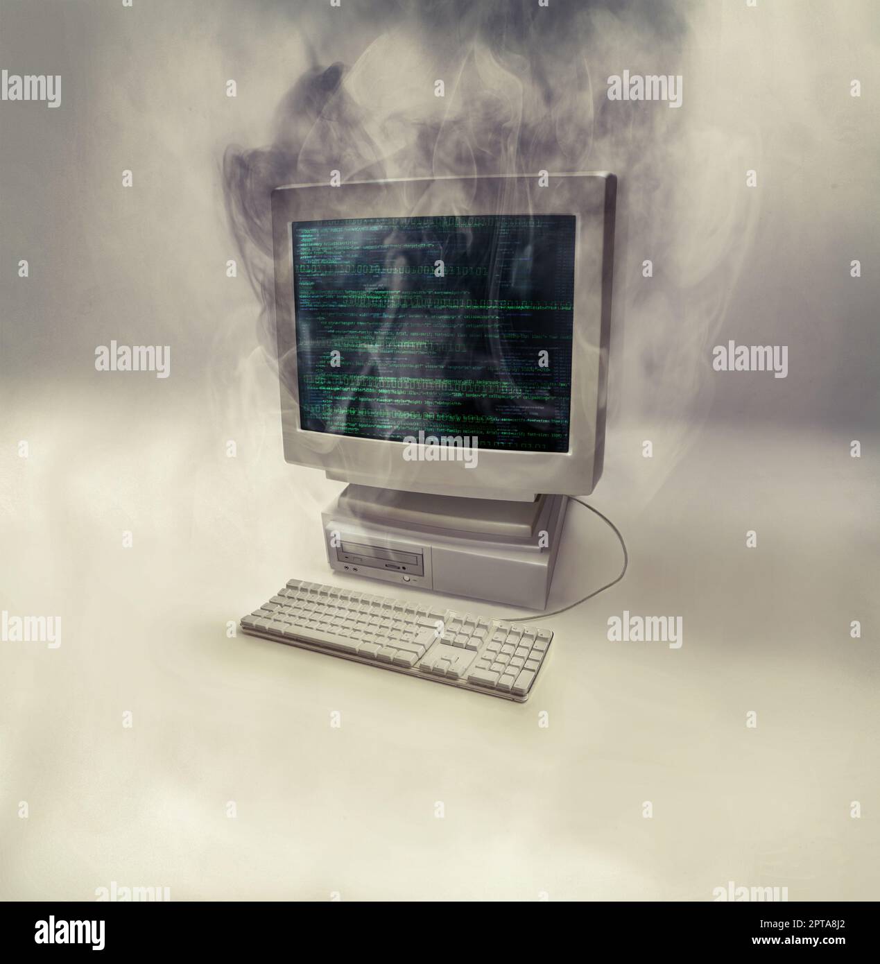 This computers time is up. a desktop computer smoking after burning out