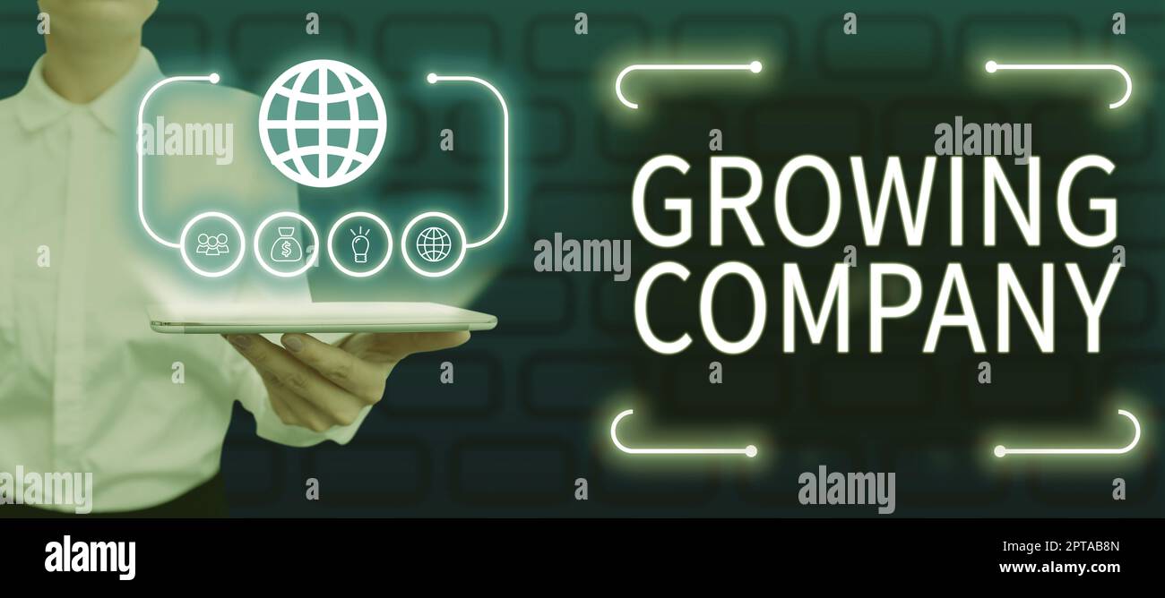 Handwriting text Growing Company, Business approach a business firm that is still undergoing a development Businesswoman Holding A Tablet With Digital Stock Photo