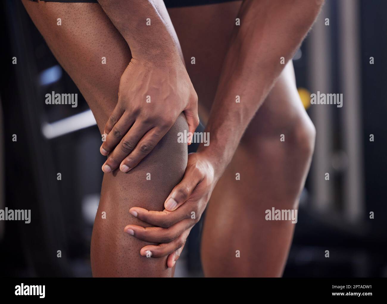 Knee pain, fitness injury and black man legs in sport health club ...