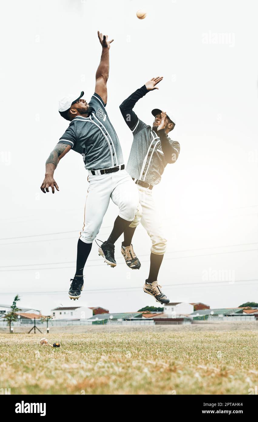 Baseball player, jump and catch baseball in game, contest or sport on