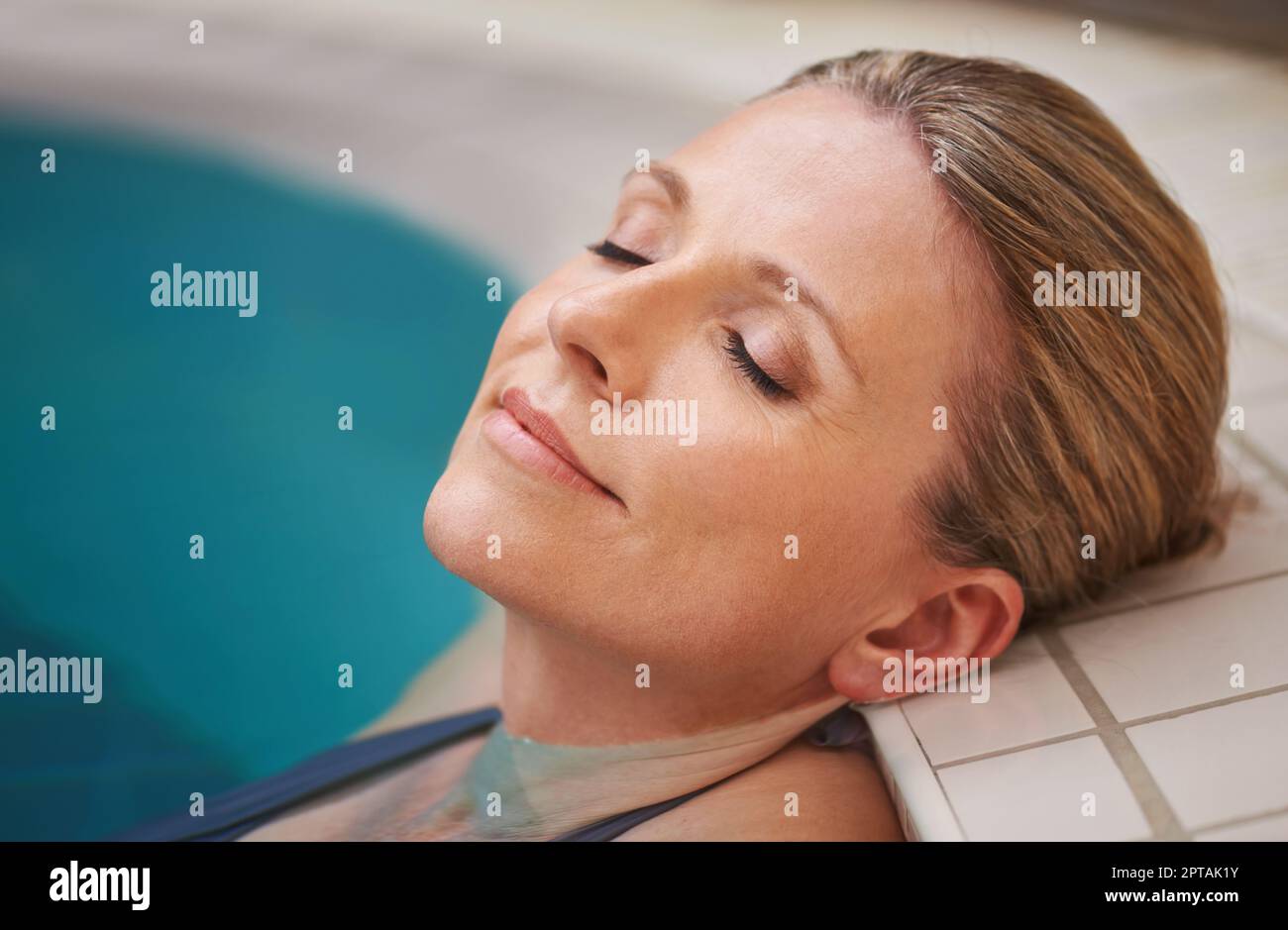 Mature woman swimming pool inside hi-res stock photography and images ...