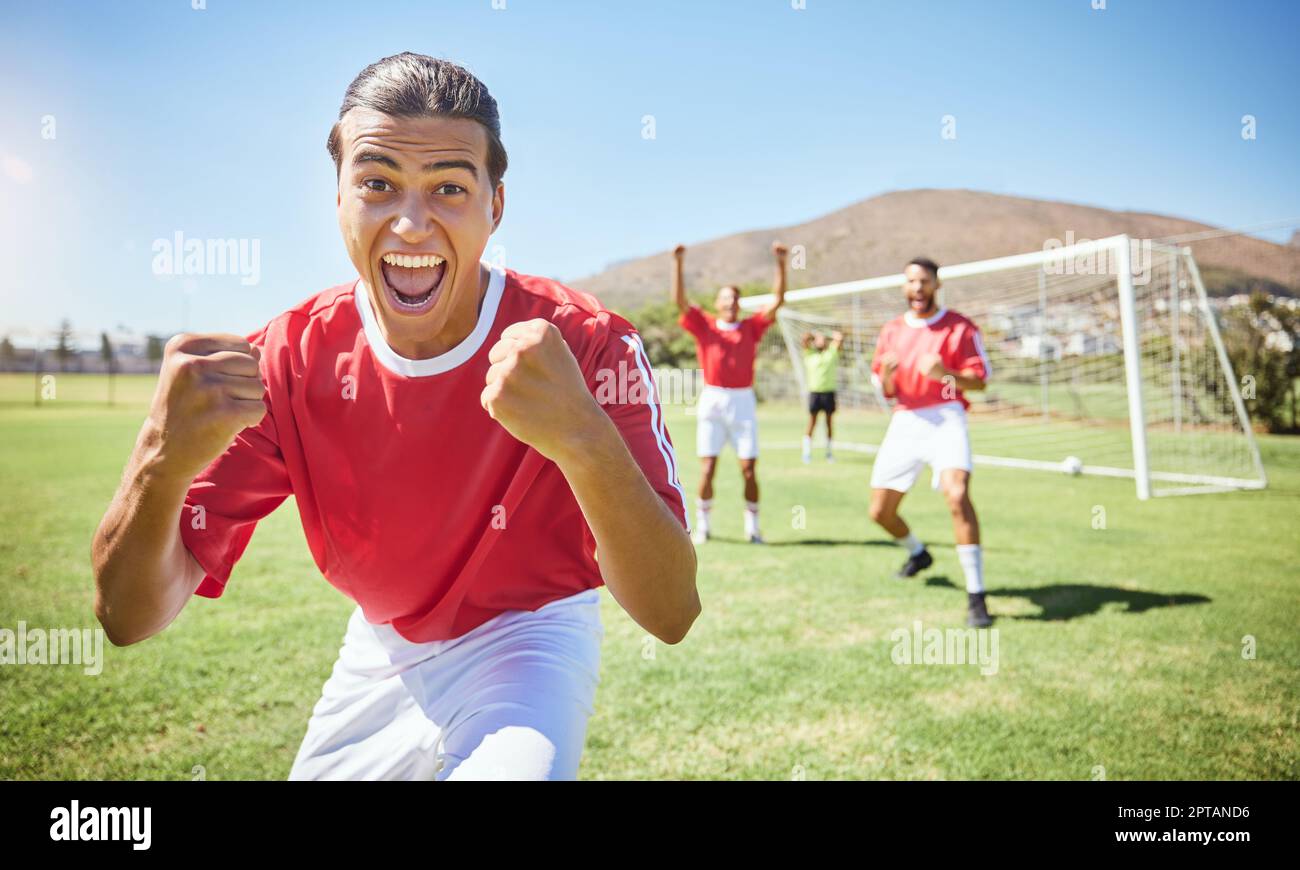 Soccer player, celebrate and winning team with fist in celebration of scoring goal for sport match, game or competition with success gesture. Victory Stock Photo