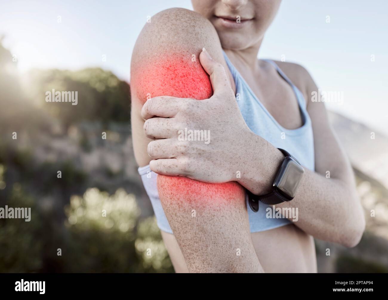 Sports injury, arm pain and a woman outside during exercise holding