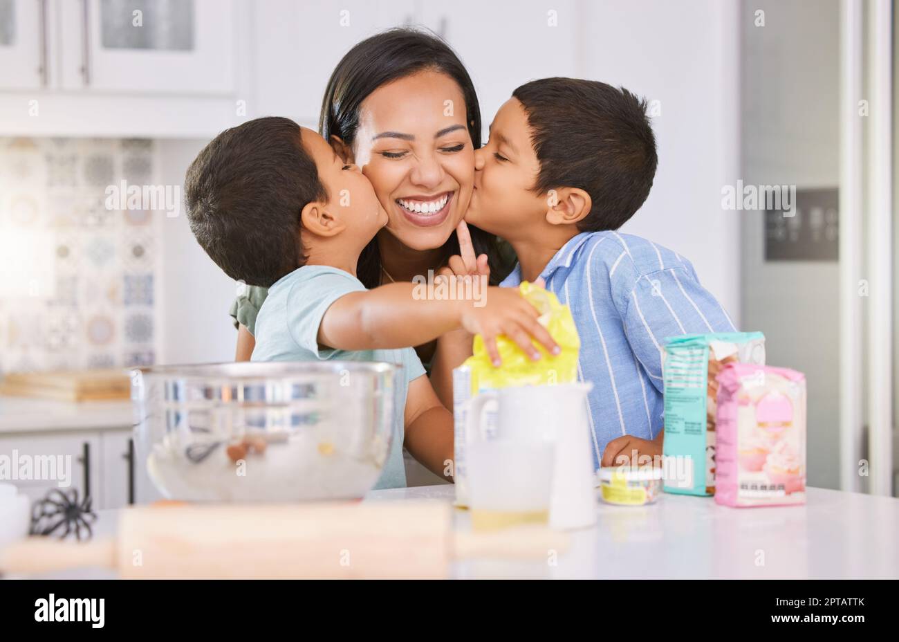 Happy, mother and children kissing cheek for love, baking and mothers