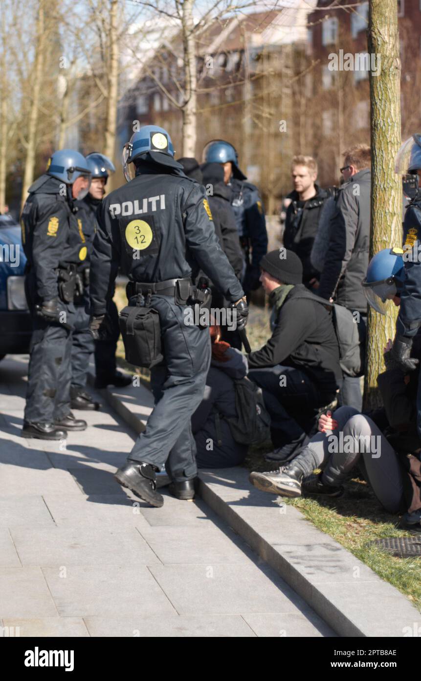 You have the right to remain silent...A group of police men making a ...