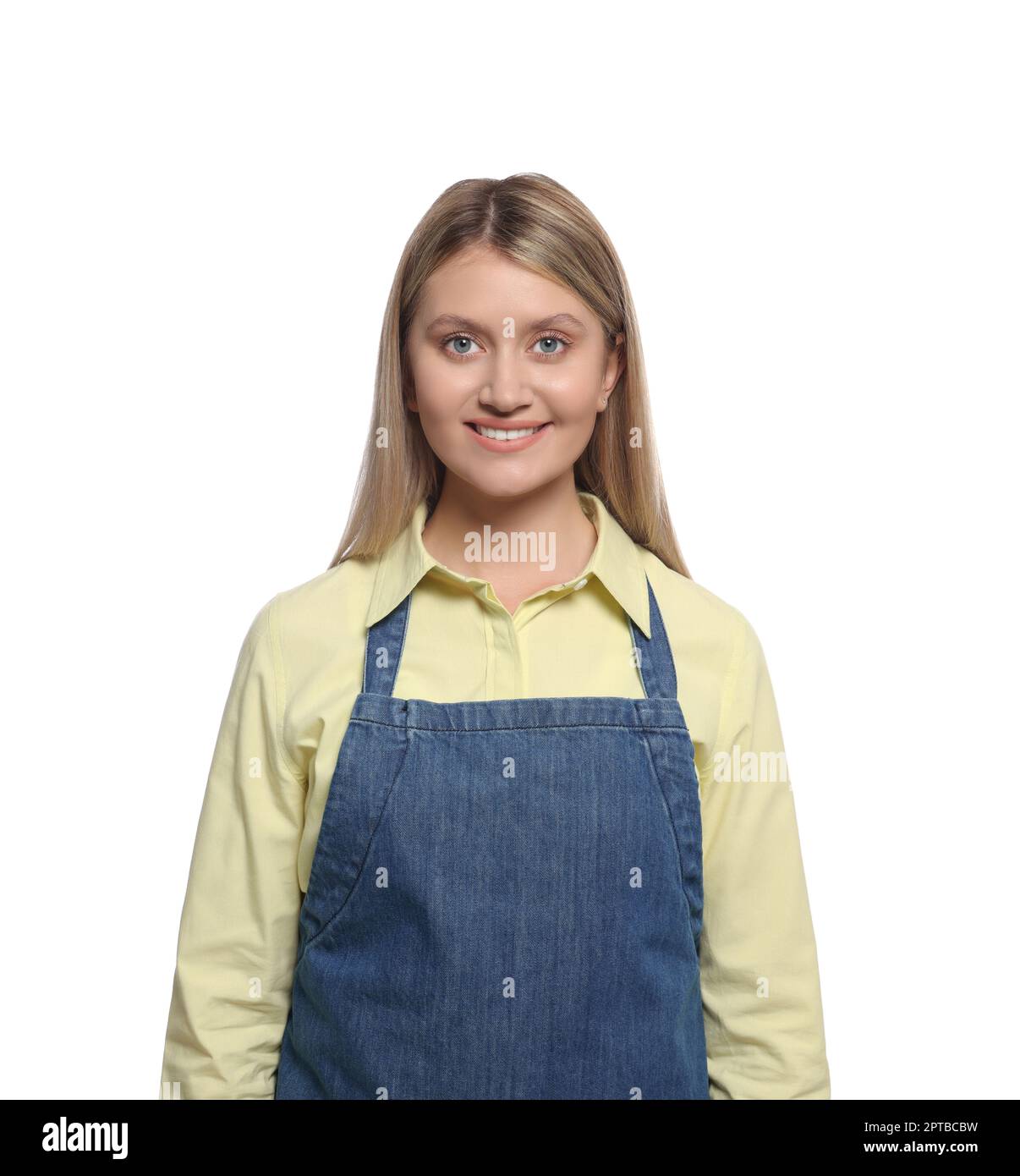 Beautiful young woman in denim apron on white background Stock Photo ...