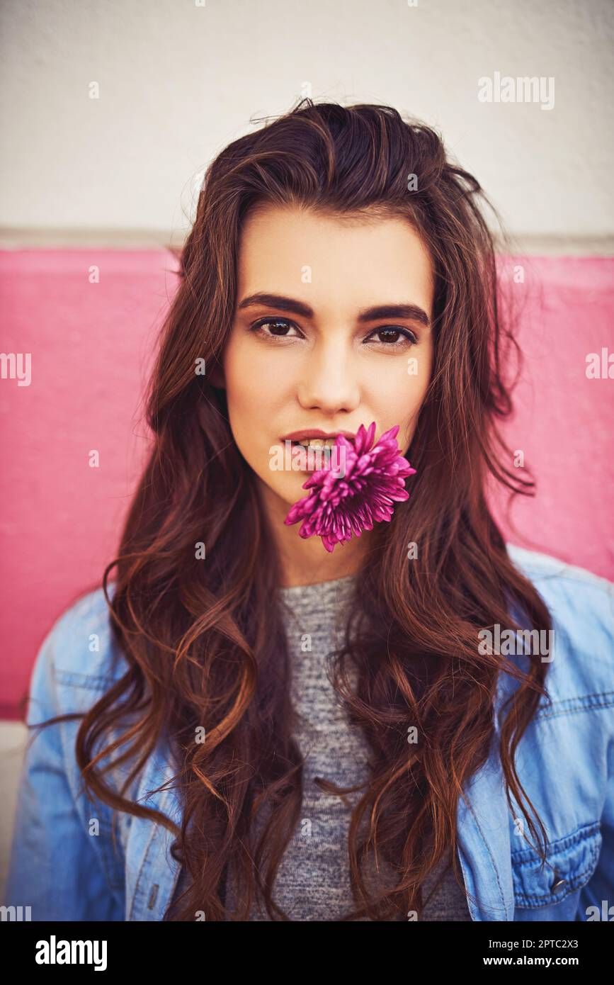 Some women like diamonds, she loves flowers instead. Portrait of a