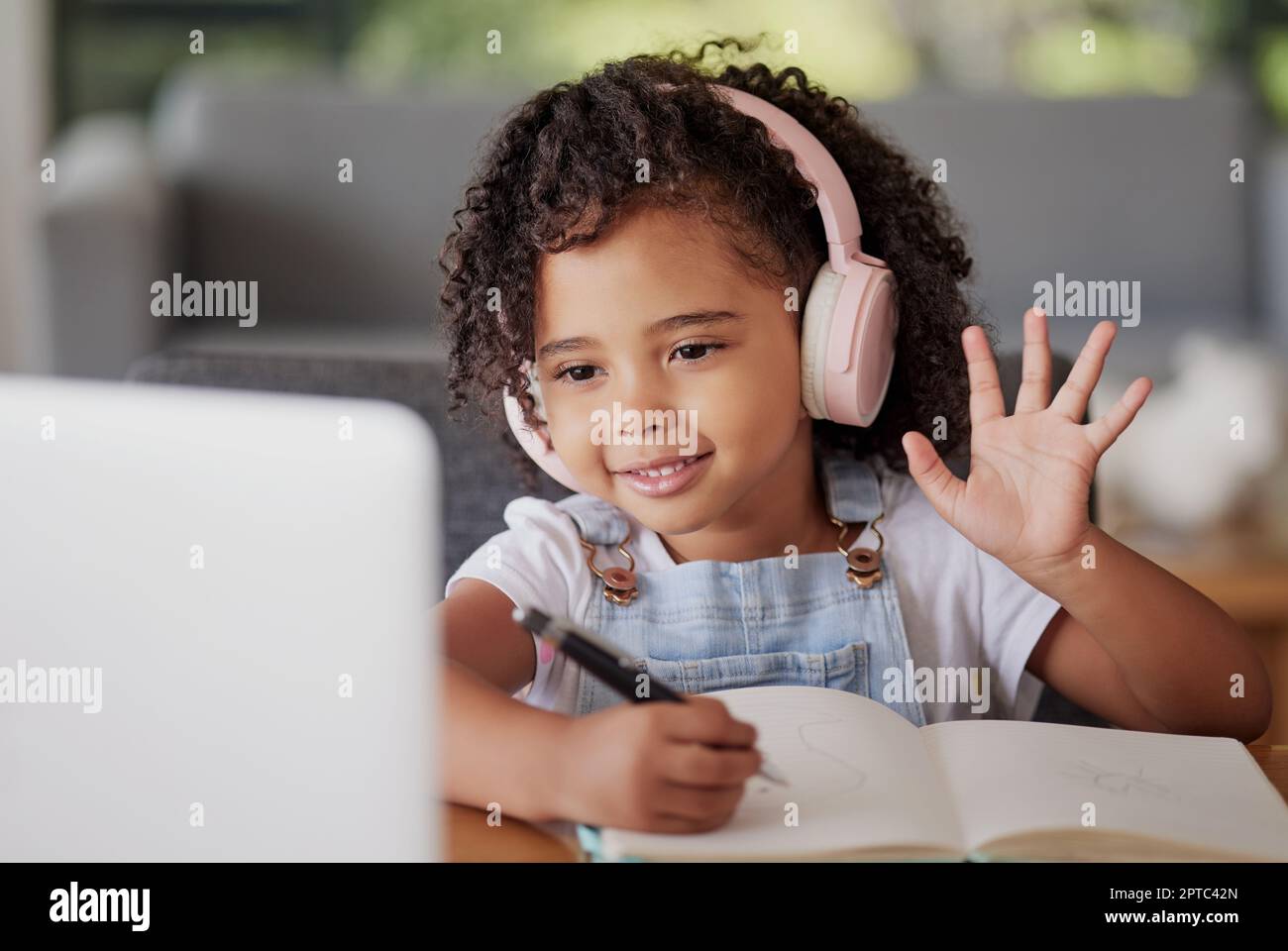 Video call, laptop and education child wave hello in online class