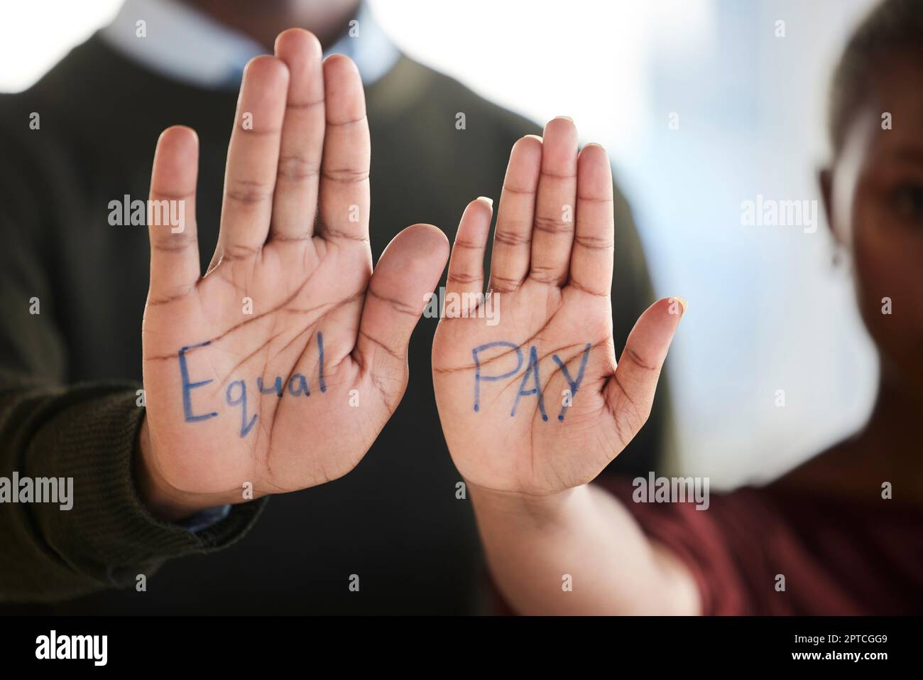 Equal pay, gender bias and salary inequality protest in workplace of