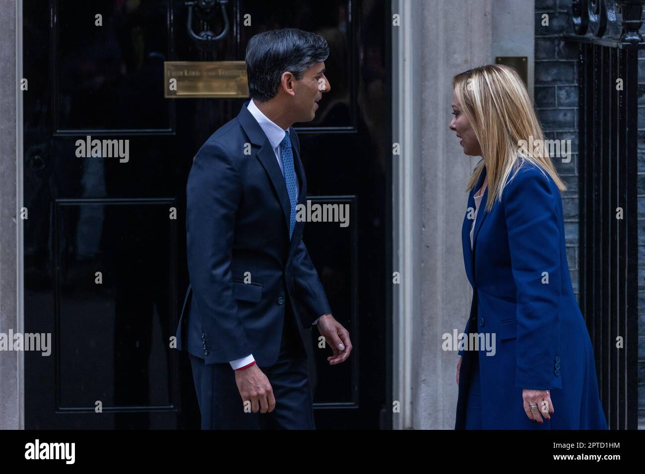 Rishi Sunak, Prime Minister of the United Kingdom, greets Meloni, Prime Minister of