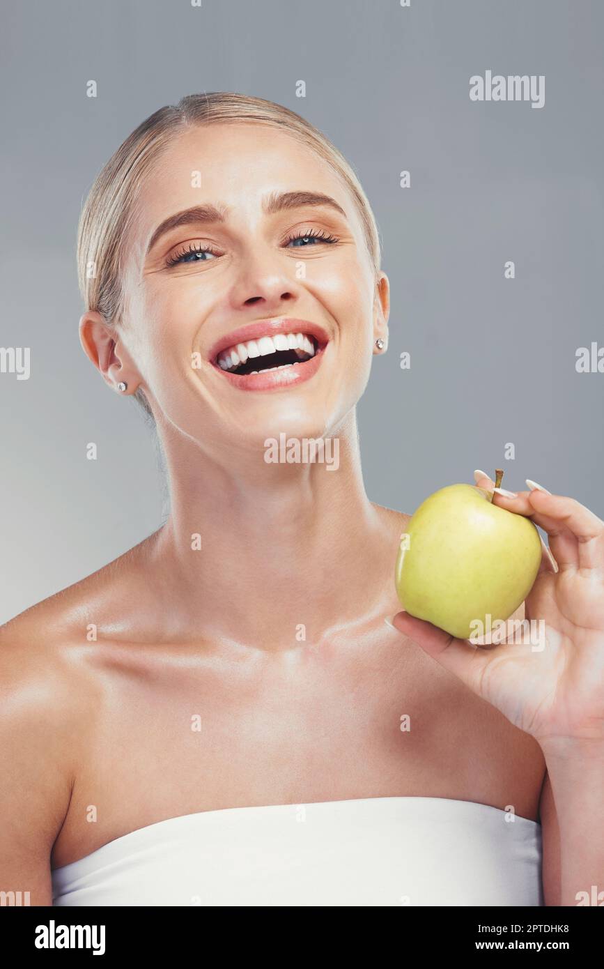 Apple, beauty and portrait of health woman with fruit for body care, antioxidants and healthy weight loss diet. Aesthetic model with nutritionist food Stock Photo