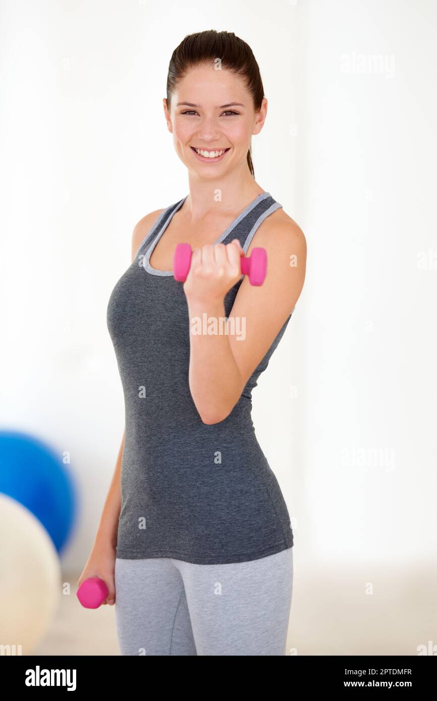 Black female wearing athletic outfit on a white background as a fitness  trainer feeling sick Stock Photo - Alamy