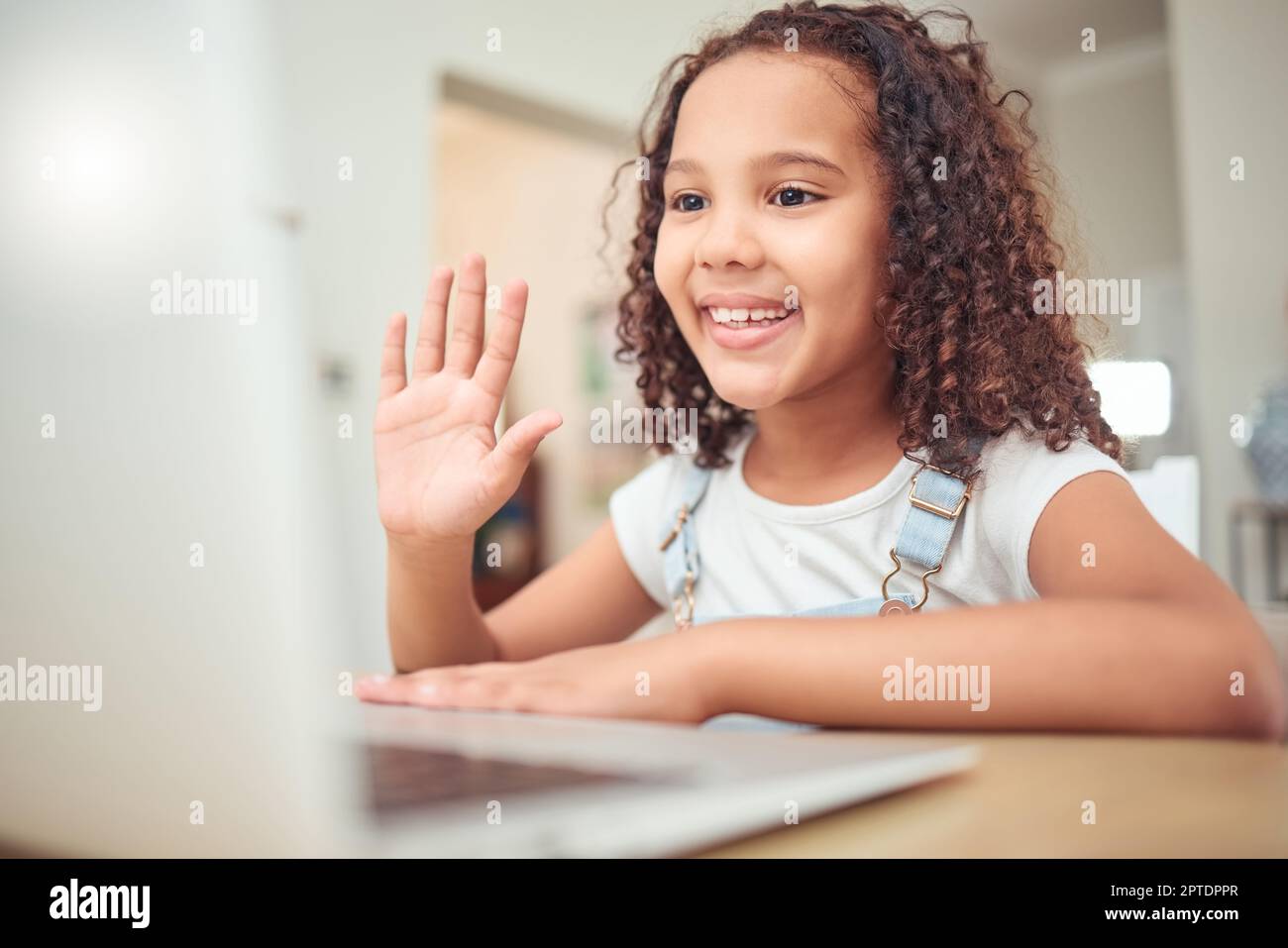 Elearning, video call and child with laptop in online class wave hello