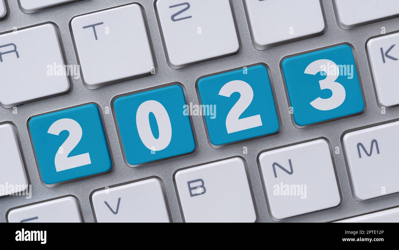A  computer keyboard with the word 2023 Stock Photo