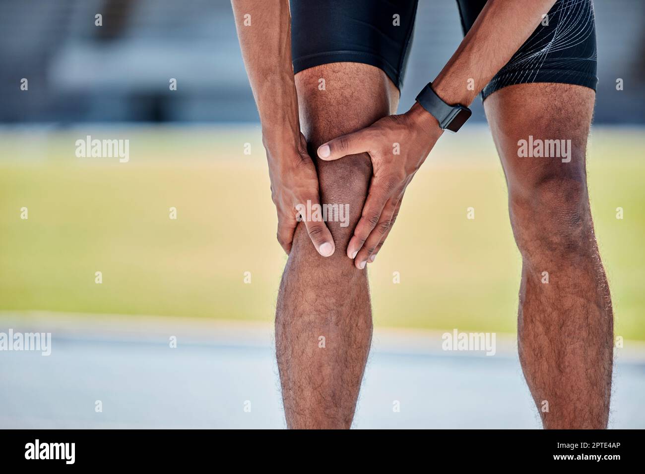 Runner, knee injury and pain in legs on field, track or sports at