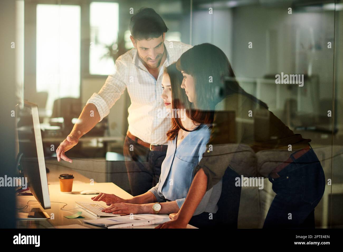 Professionals at work. a group of colleagues brainstorming around a ...